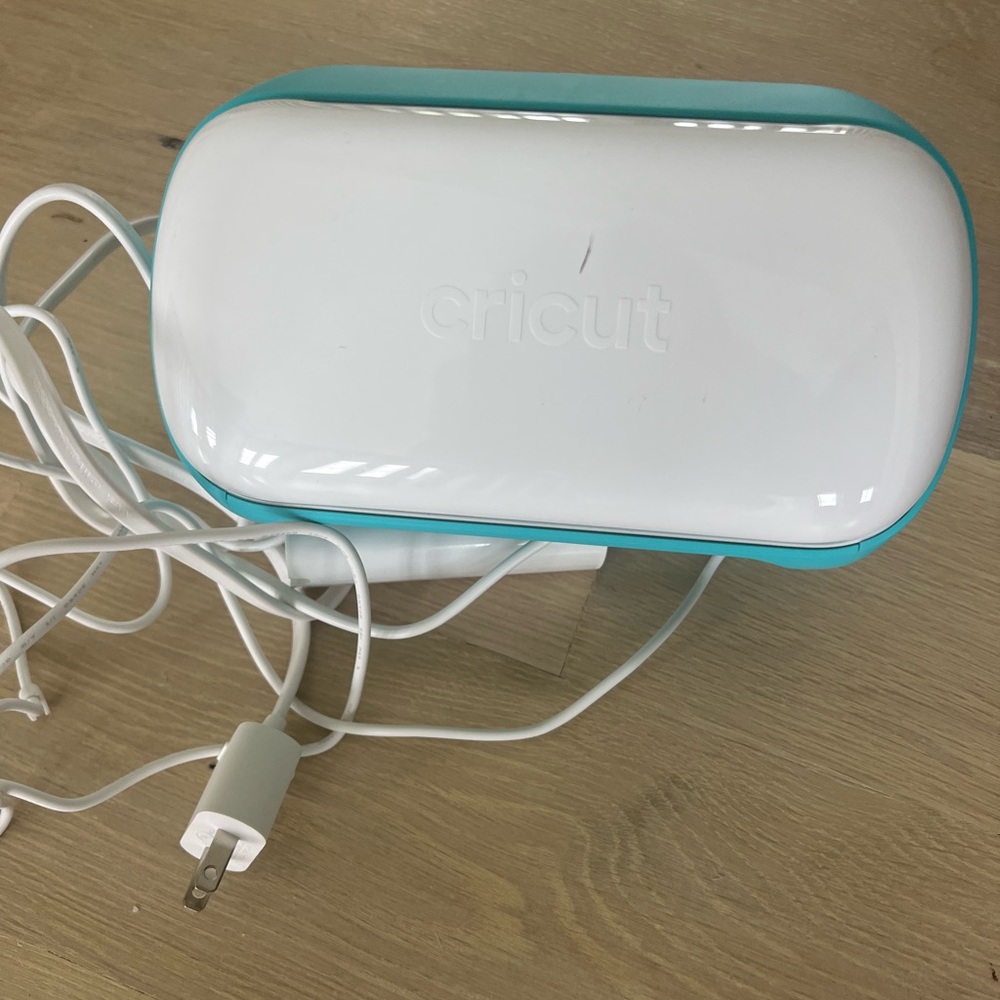 Cricut Joy Machine 
A ton of vinyl and small hand held heated iron included